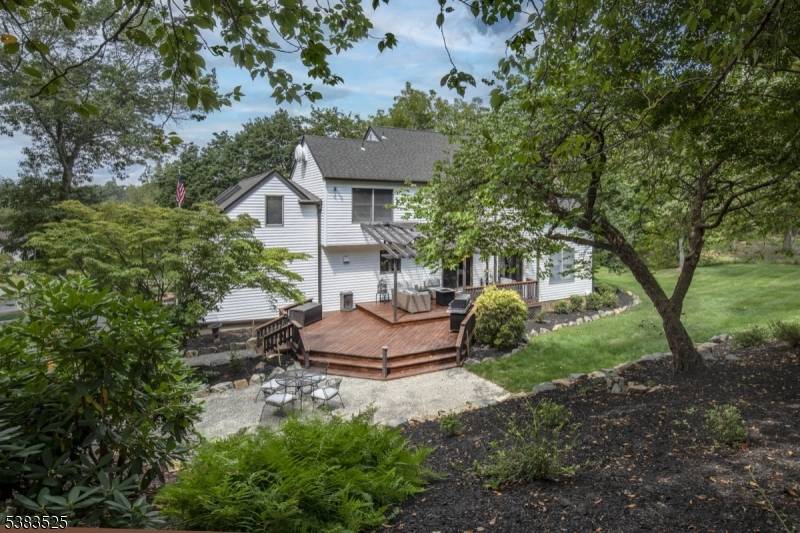 Located in the sought after Tiger Hill neighborhood of Peapack Gladstone, this stately home sits on nearly two acres of thoughtfully landscaped property.