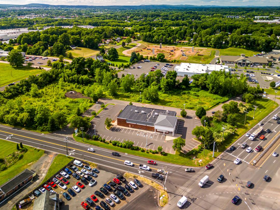 Just south of Hartford and North of New Haven.