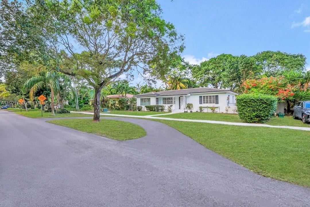 Charming Home on Beautiful Tree Lined Street in Prime Miami Shores !