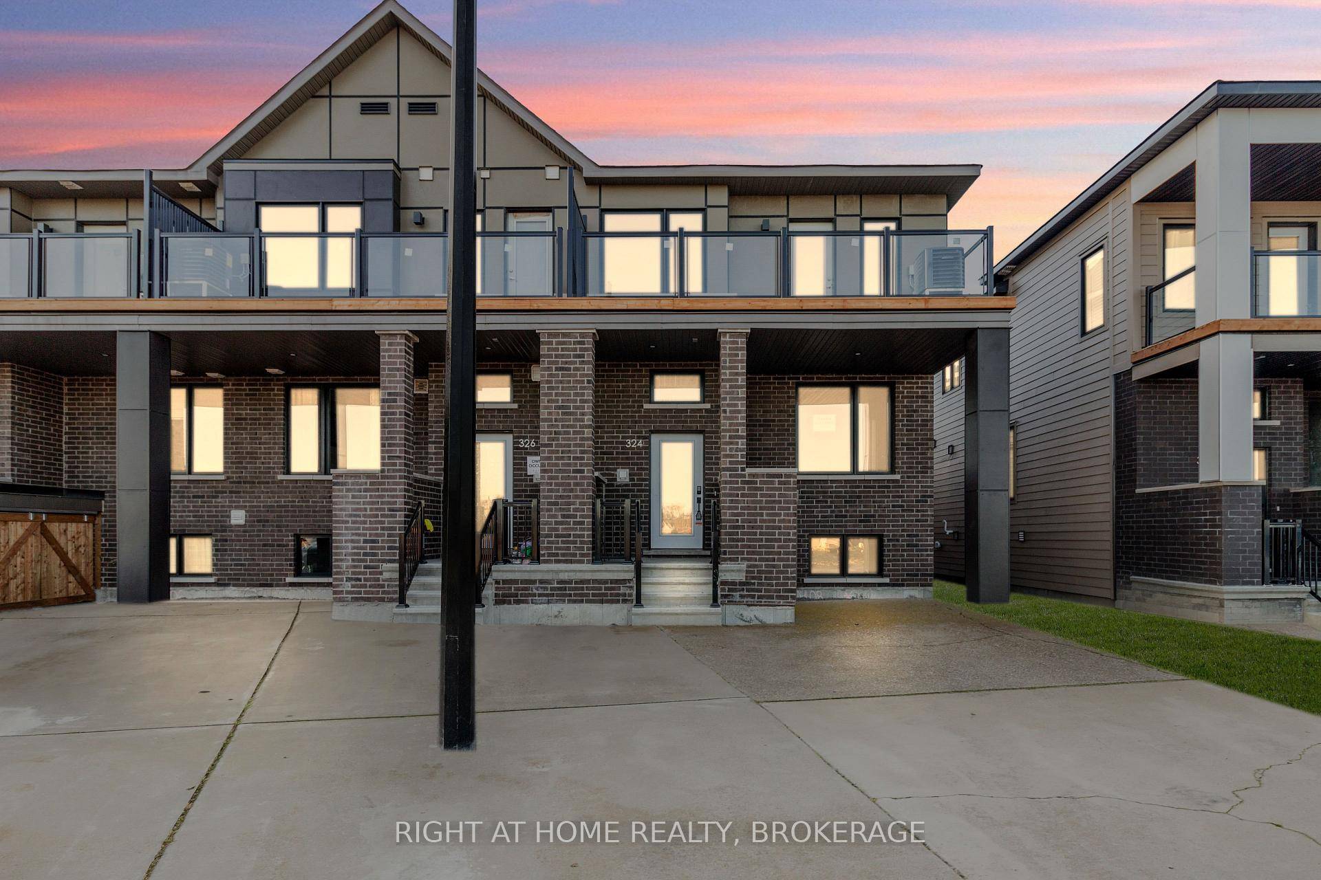 Welcome This Beautiful, Modern, End Unit Townhouse with Balcony.