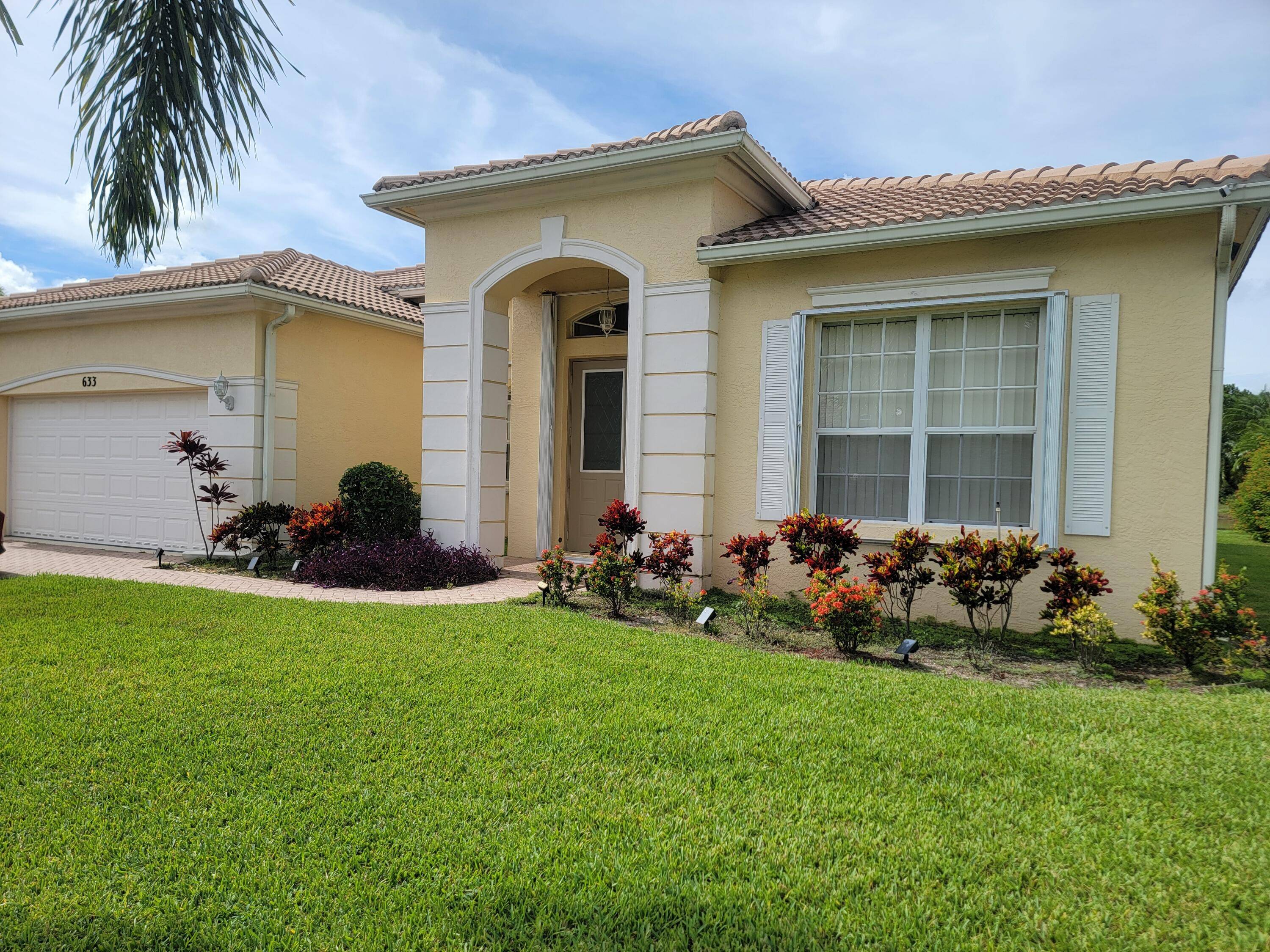 This stunning 3 bedroom, 2 bathroom home with den is perfectly situated on an immaculate lake in the highly desirable gated community of Lake Forest.