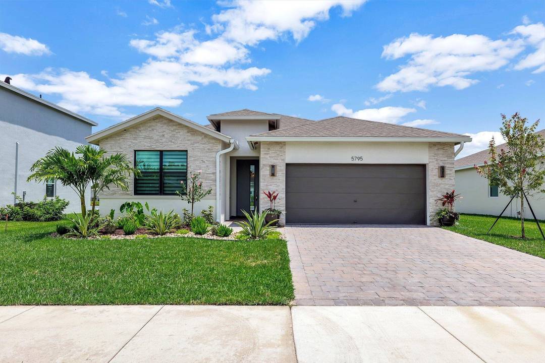 Move into this beautifully furnished and spacious 4 bedroom home, in a gated community with pool access.
