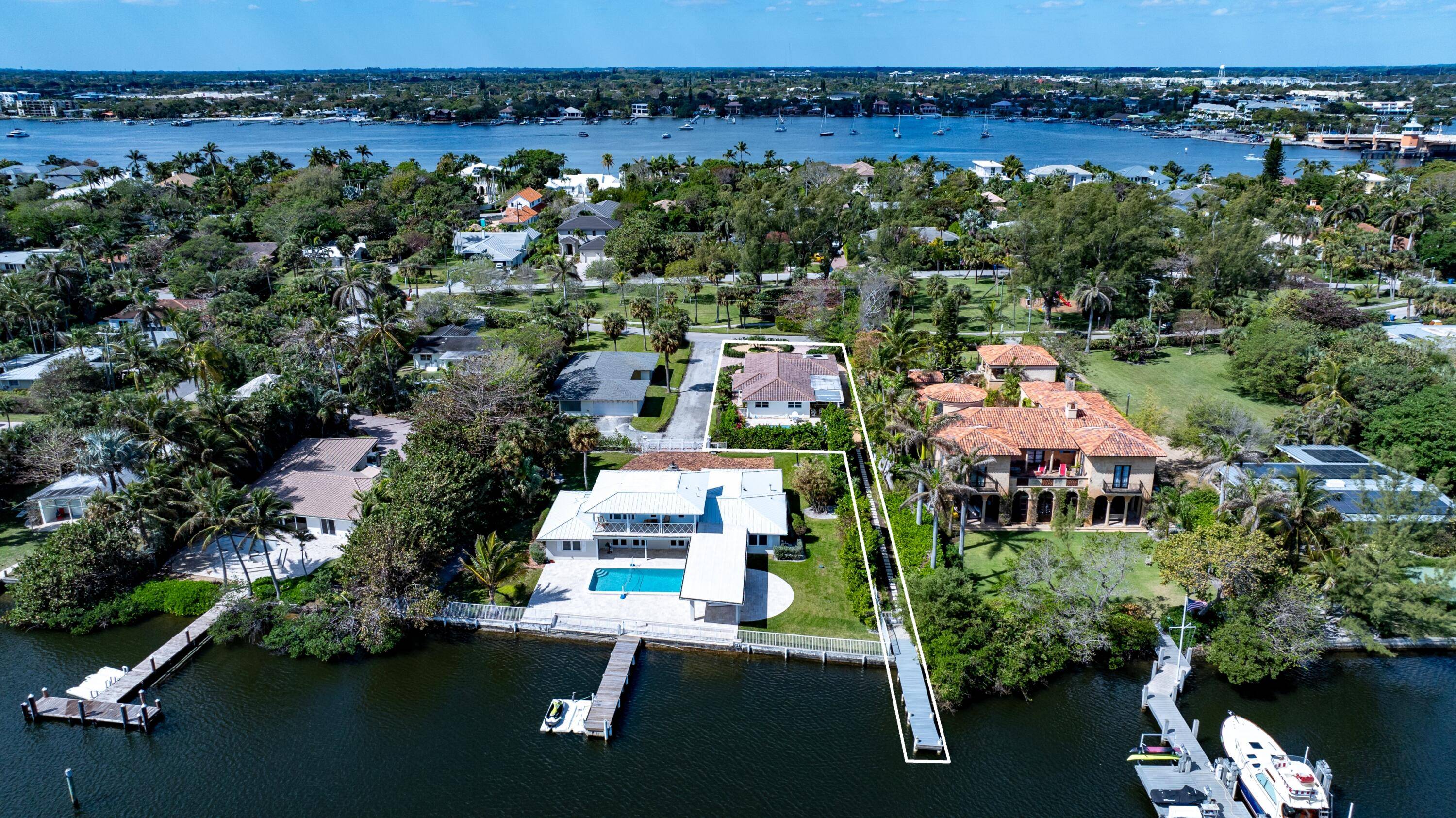Across from the Hypoluxo Island Park on a private street, this re imagined vintage cottage features waterfrontage with a new private 46 foot composite dock.