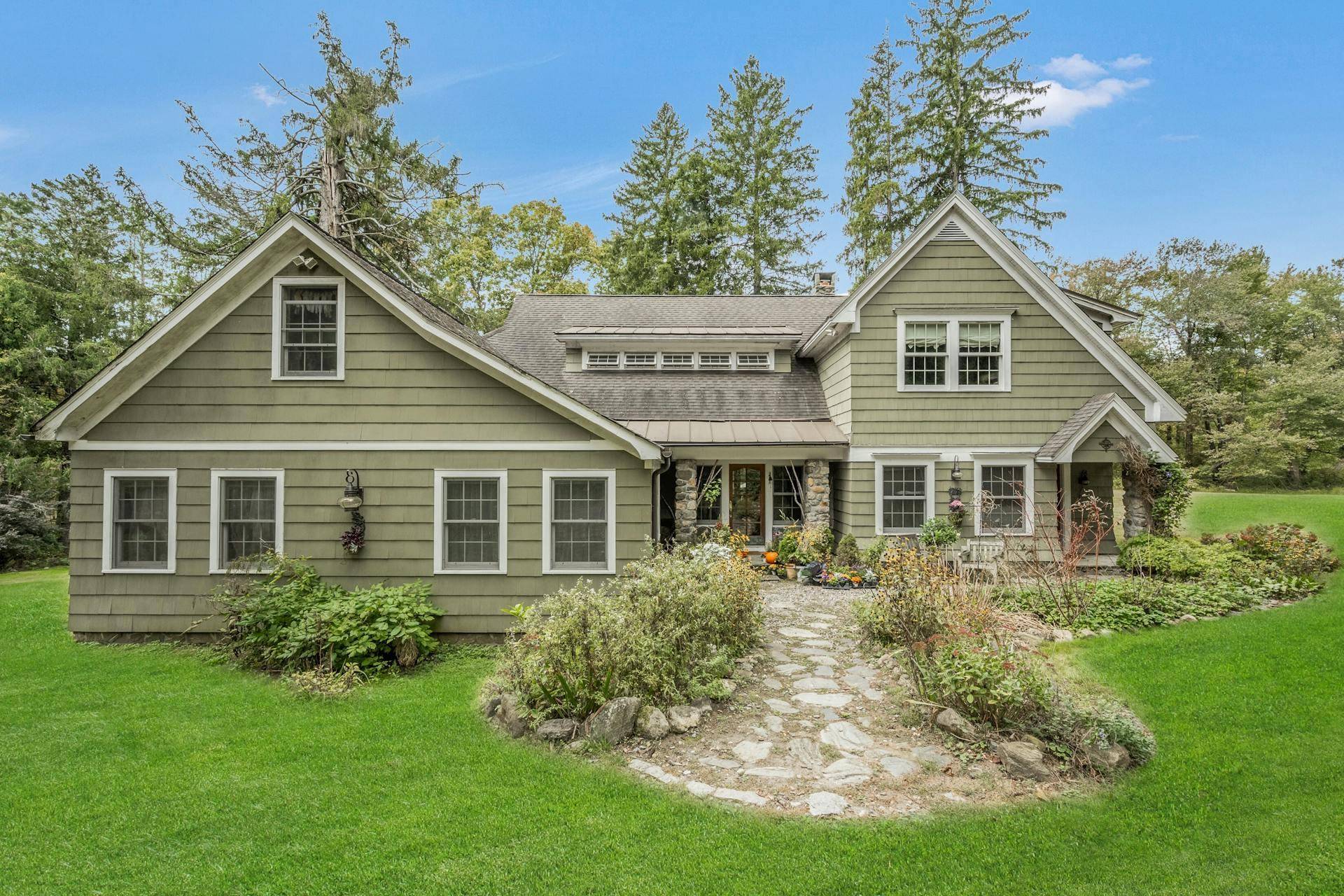 Nestled on over 8 picturesque acres, this remarkable 5, 250 sf farmhouse estate, dating back to the late 1700s, offers an unparalleled blend of historic charm and modern amenities.