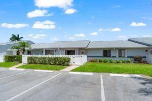 Welcome to this updated, move in ready, condo nestled in the vibrant 55 pet friendly community of The Arbours of the Palm Beaches.