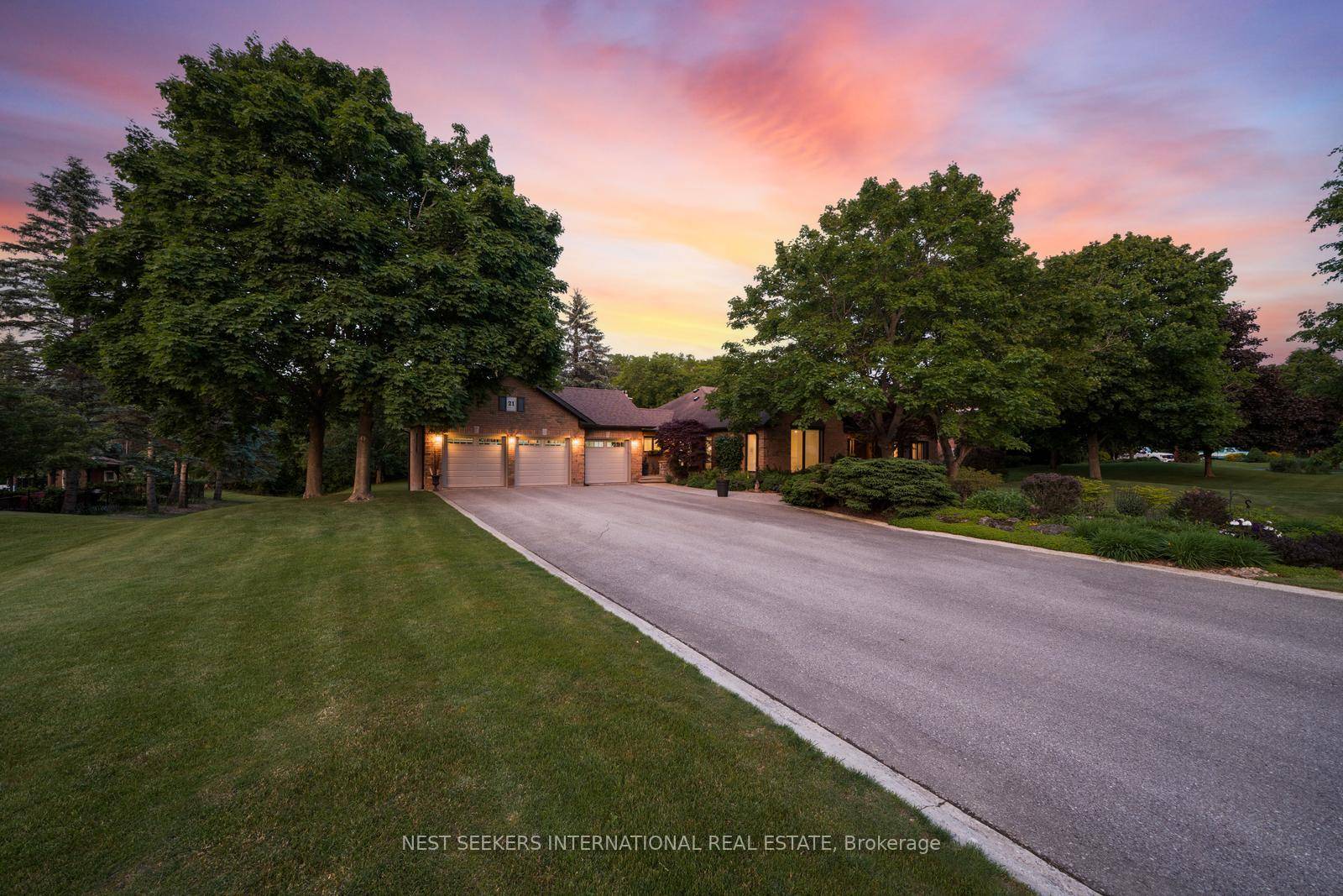 Tucked away on a breathtaking one acre ravine estate lot backing onto the East Humber River, this custom built ranch style walk out bungalow offers over 6, 300 sq.