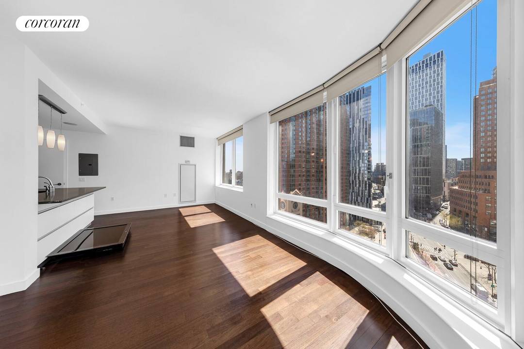 Spacious and exceptionally bright corner one bedroom, one bath condominium at The Oro Condominiums.