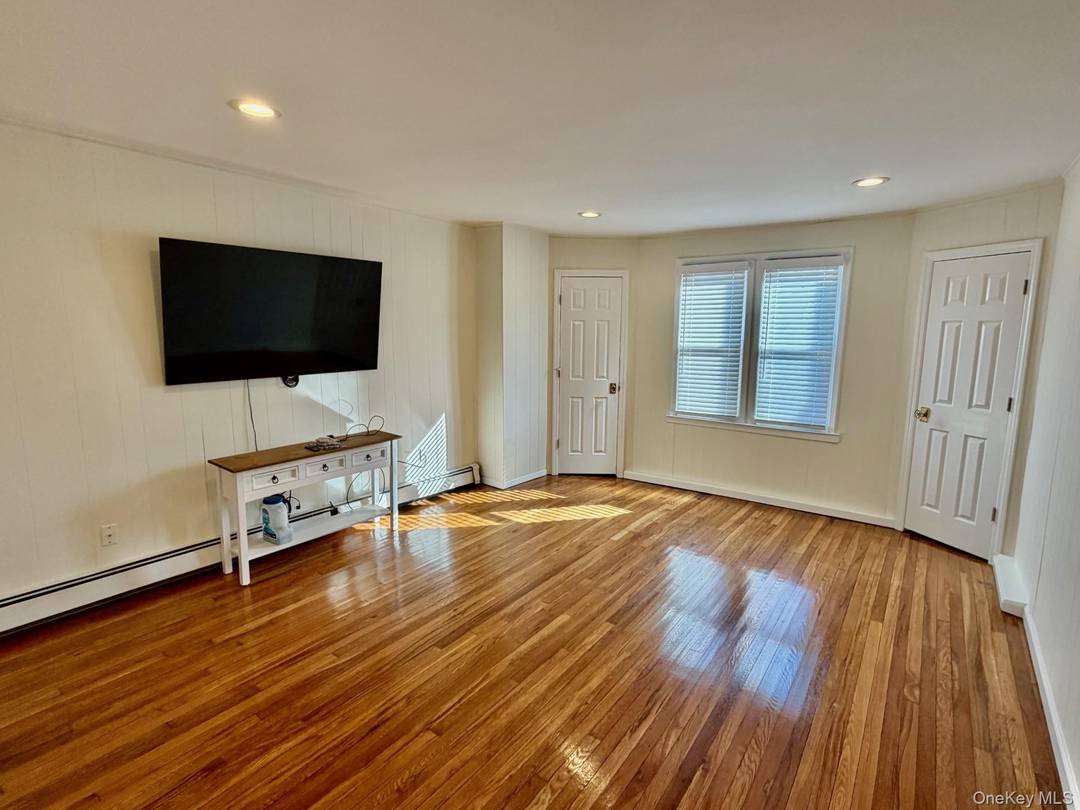 This beautiful three bedroom, one bath upper floor is a perfect blend of comfort and convenience.