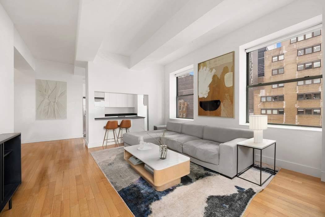 Welcome to Residence 2402, your dream apartment nestled in the Financial District.
