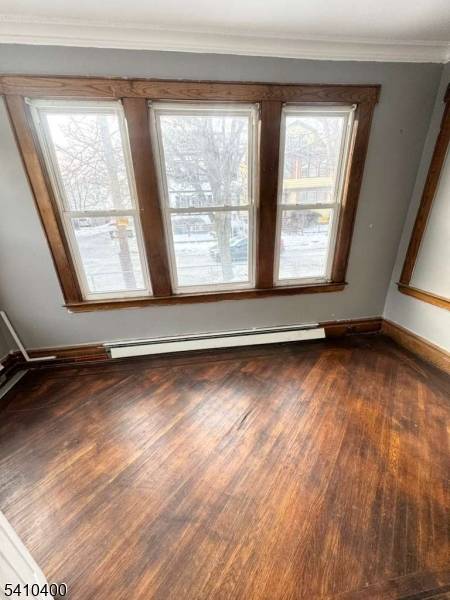 Huge corner lot single family home with 3 bedrooms, 3 full baths, and an additional room.