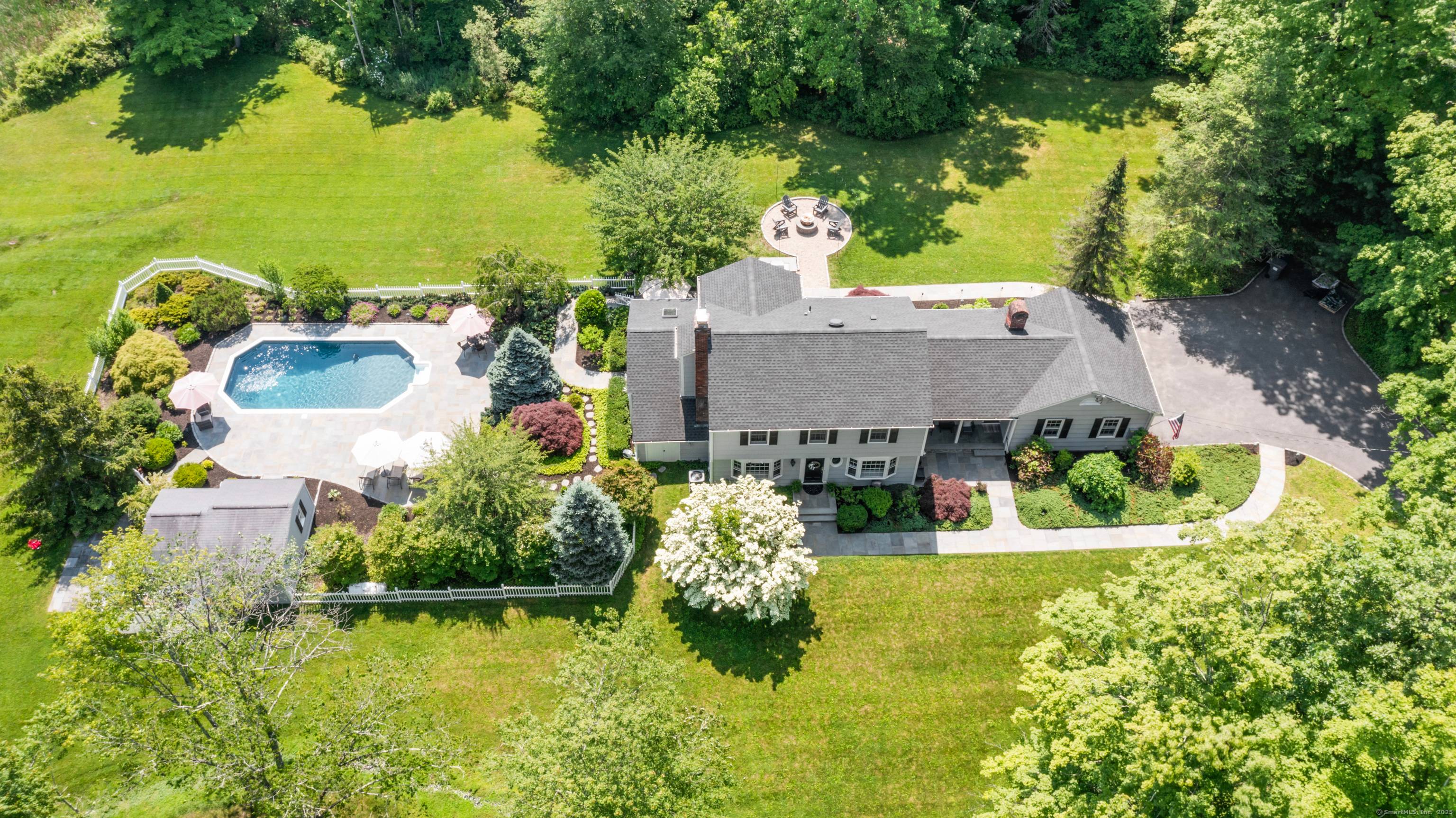 Nestled on a secluded, tranquil lot in a warm neighborhood known for friendly block parties, this move in ready home offers a resort like sanctuary.