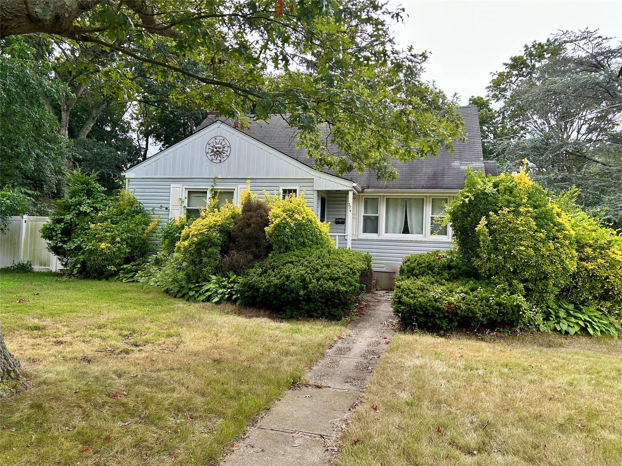 4 bedroom Cape with breezeway to a 1 car garage and a full basement with outside entrance, hardwood floors, fenced in backyard, above ground oil tank in basement, House needs ...