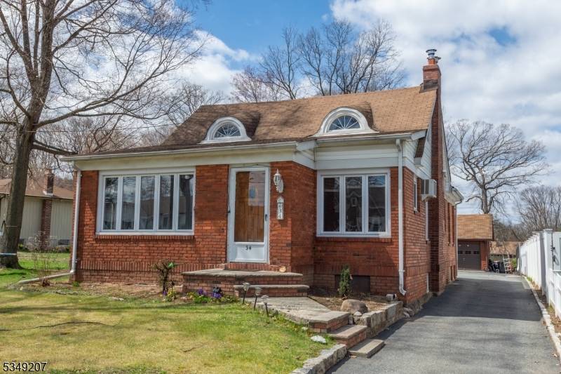 Charming character filled home situated on an oversized lot in desirable North End neighborhood of Cedar Grove.