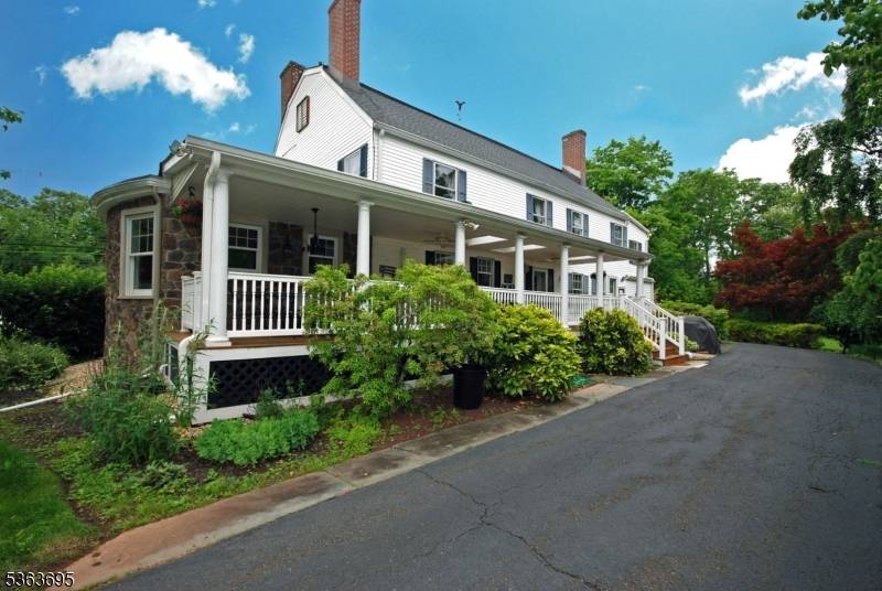 Step Into History With This Stunning Turn Of The Century 2 FAMILY HOME Located In The Heart Of Branchburg !