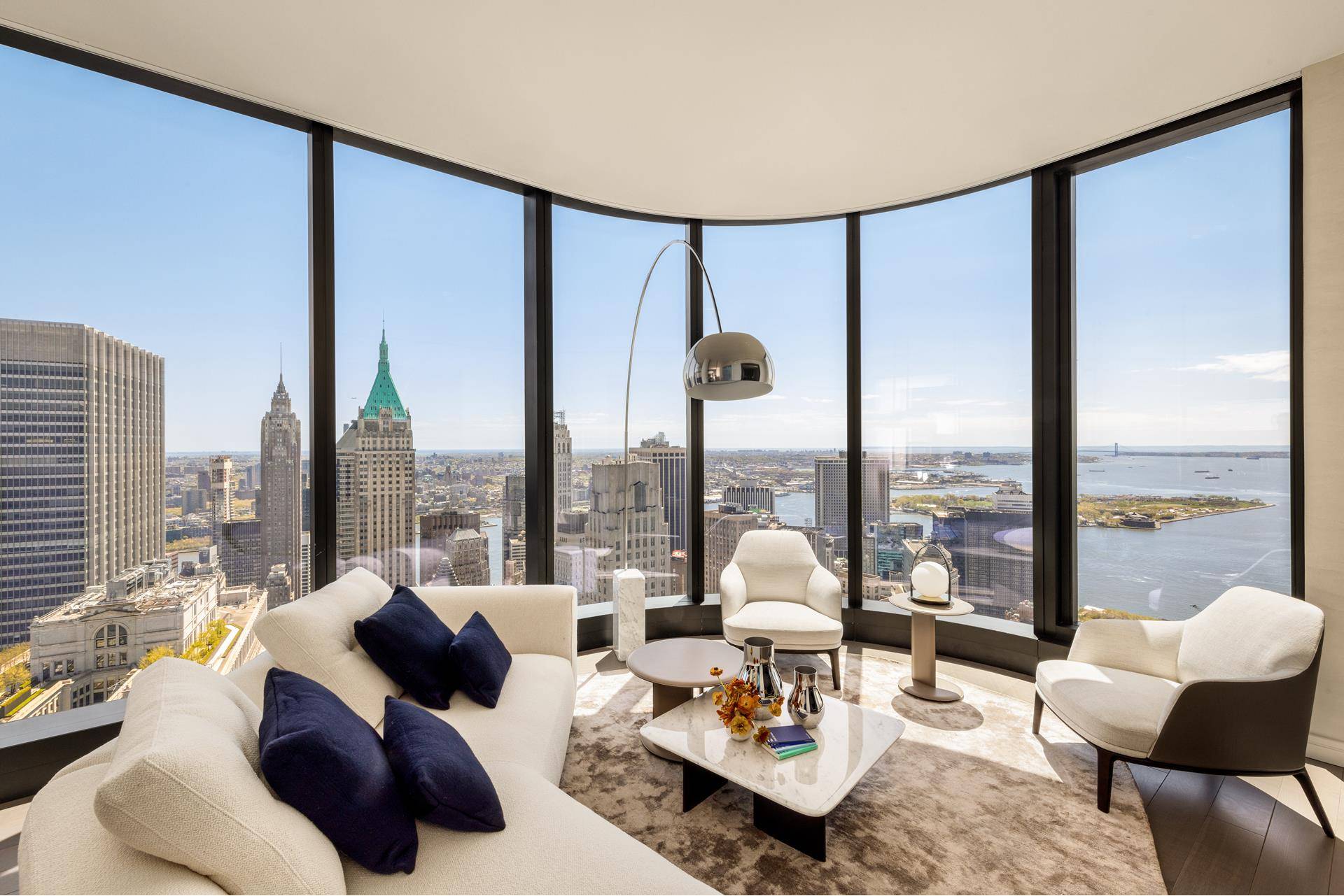 Enter Residence 68D at The Greenwich by Rafael Vi oly, a one bedroom, one and a half bathroom with magnificent southern and western views from the floor to ceiling windows.
