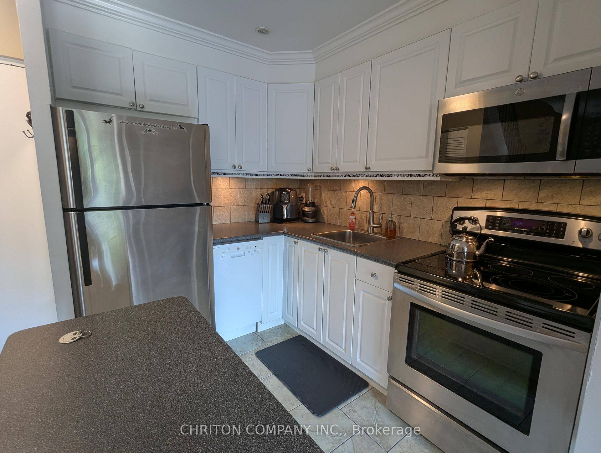 A well kept two storie unit backing on the playground and conservation area.