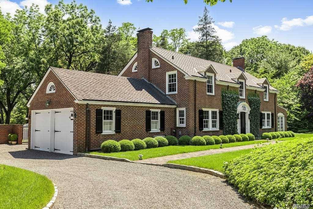 Circa 1931 Center Hall Brick Colonial Featuring Breathtaking Grounds, Winter Water Views And Updated For Todays Living While Maintaining Its Timeless Elegance.