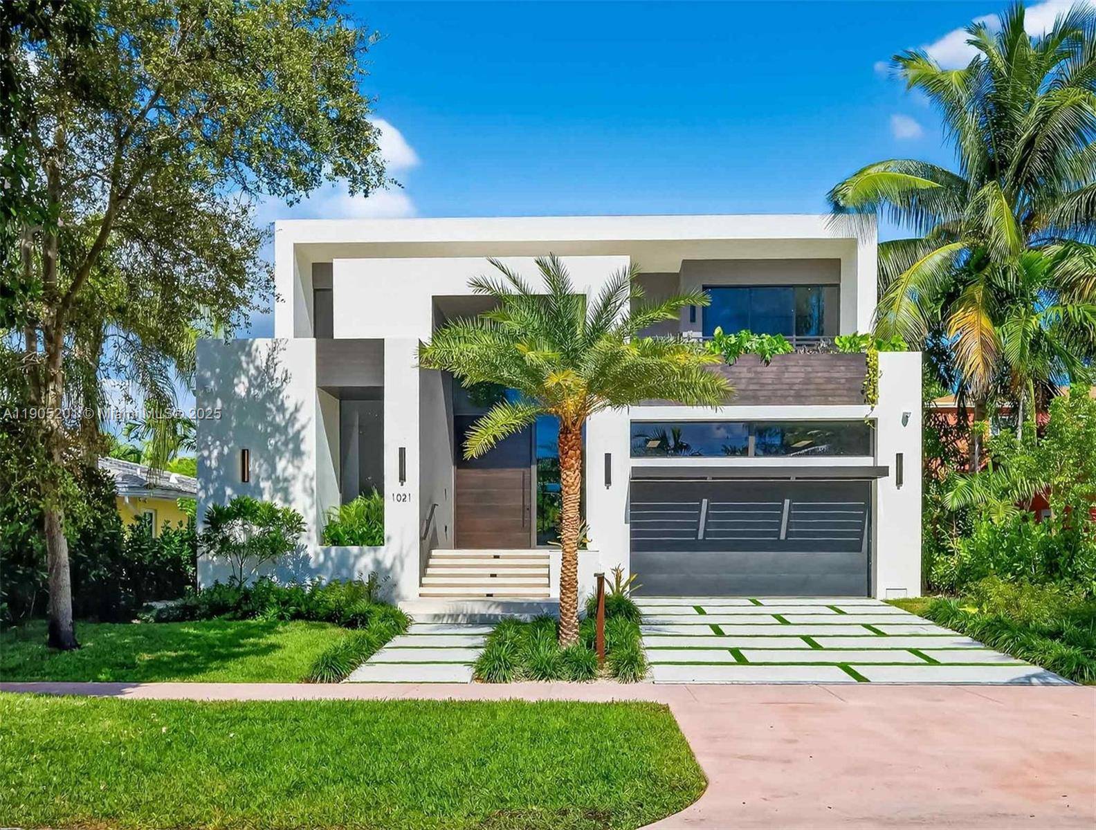 A brand new two level modern residence epitomizes the essence of Miami Beach living.