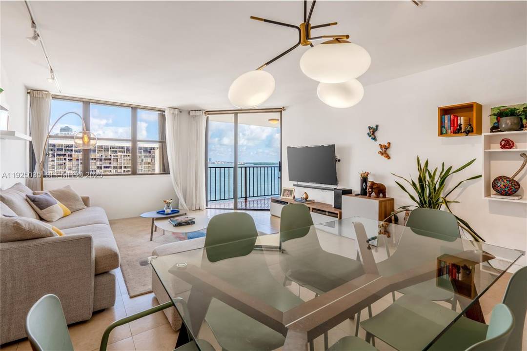 Take a look INSIDE this immaculate, oversized 20th floor residence at Brickell Place.