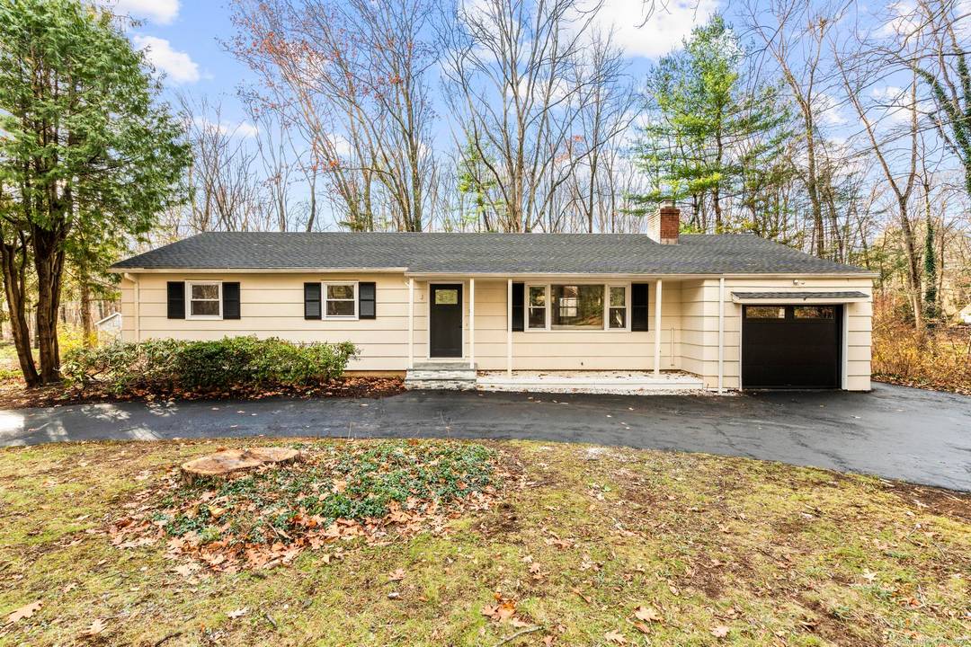 24 Evergreen Road in North Branford offers a peaceful residential setting with convenient access to local shops, parks, and commuter routes.