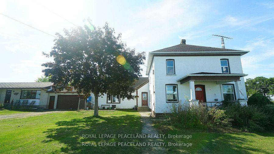 Beautiful Bungalow Features An Open Concept Living Room And Kitchen.