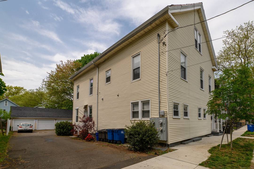 Spacious and wonderfully remodeled, 4 bedroom, 2 bathroom, second floor apartment in East Rock area of New Haven with off street parking.