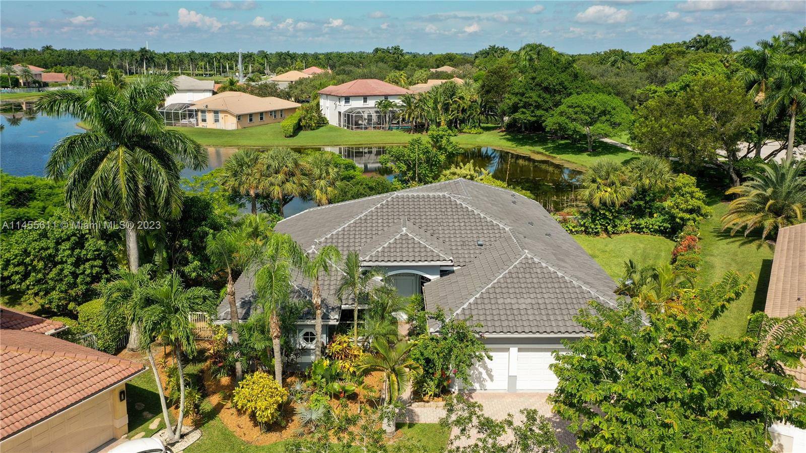 Meticulously REMODELED, FULLY FURNISHED and CONTEMPORARY 5 bedroom 4 bathroom residence with mesmerizing lakefront views.
