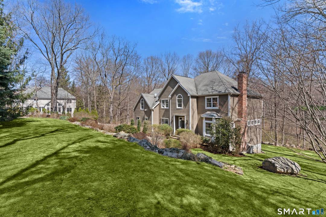 This luxurious 5BR colonial in the desirable Cranbury section, is right on the Wilton border and only 10 minutes to Westport center.