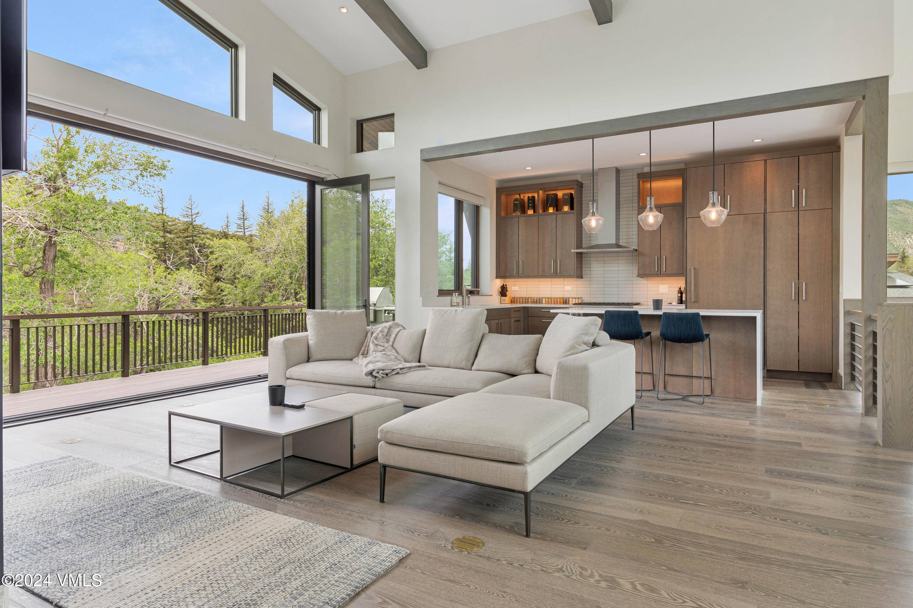 Experience the perfect balance of modern luxury and natural beauty at 358 Riverfront Lane.