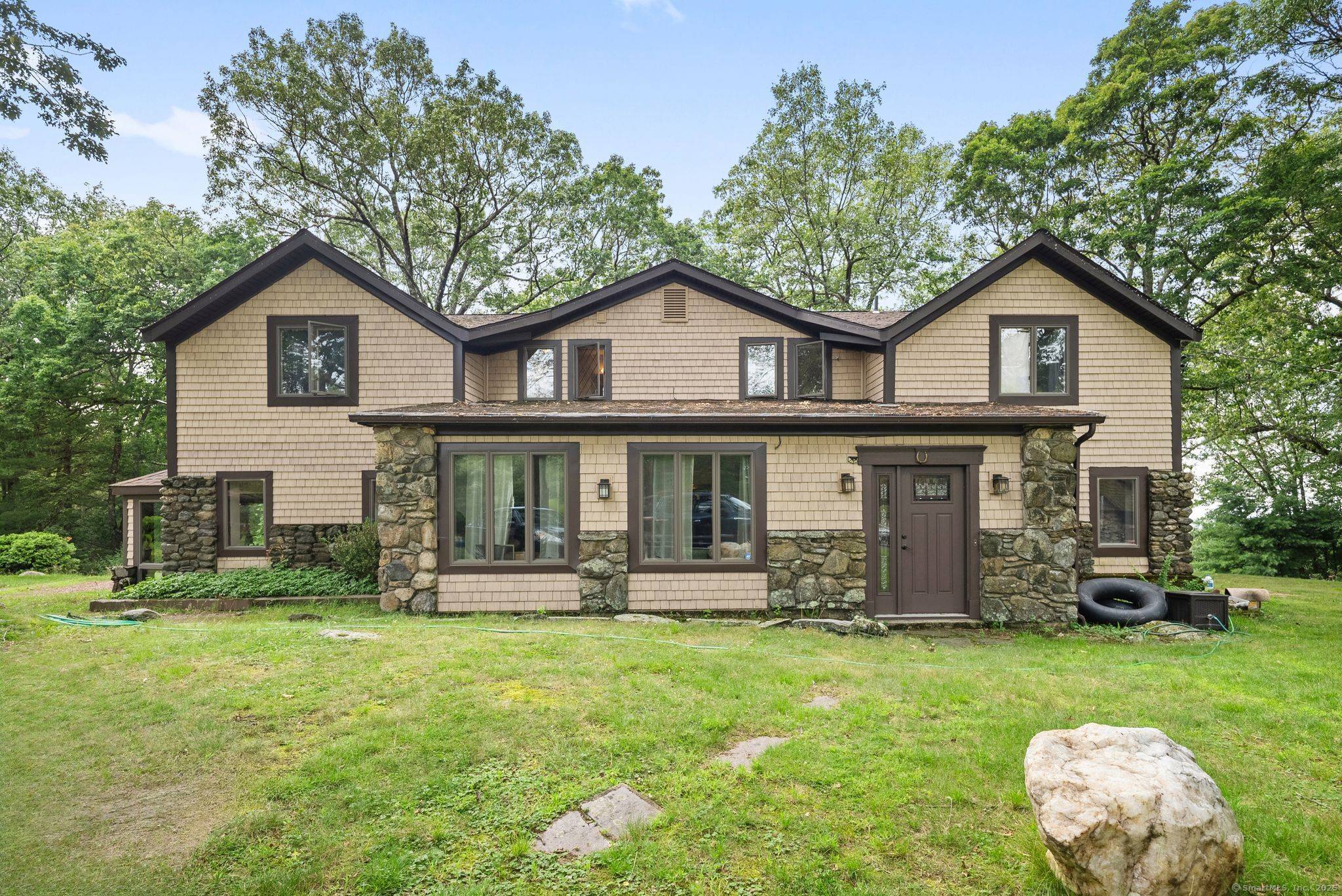 Discover the breathtaking LeClair Estate and Stone Cottage on Doyle Farm, a rare 6 acre retreat with stunning western views.