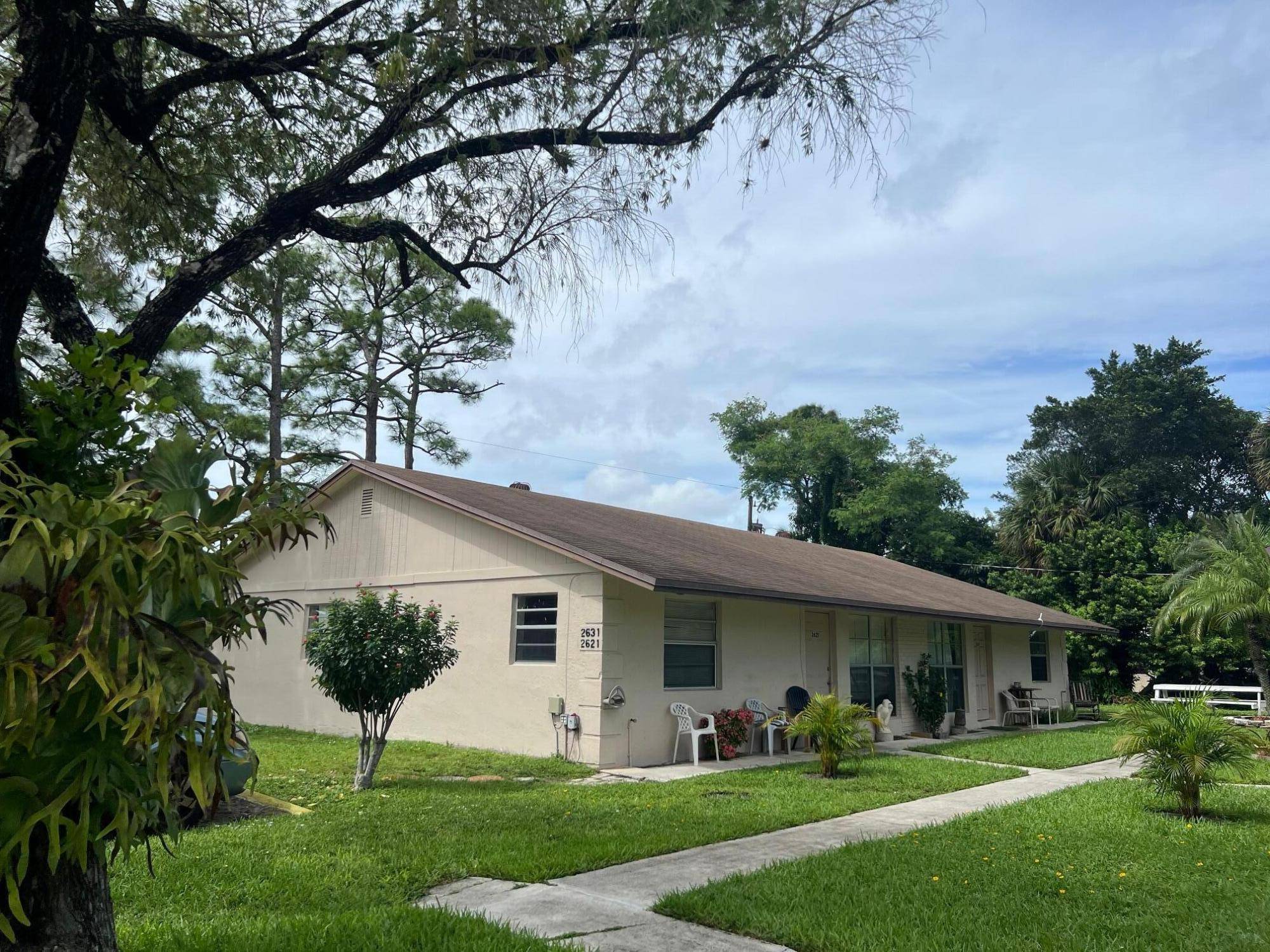 Rare Investment Opportunity Two Duplexes on One Lot in Stuart with NO HOA !