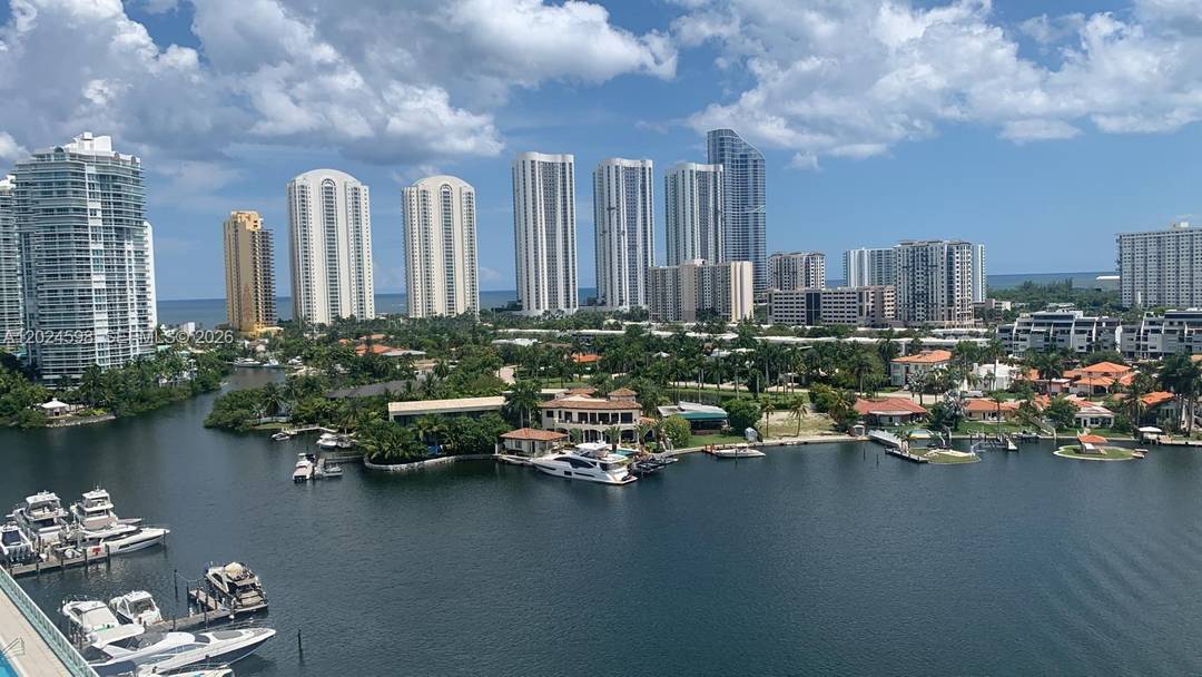Stunning 2BR 3BA residence at 400 Sunny Isles with 1, 710 SF of luxury living.