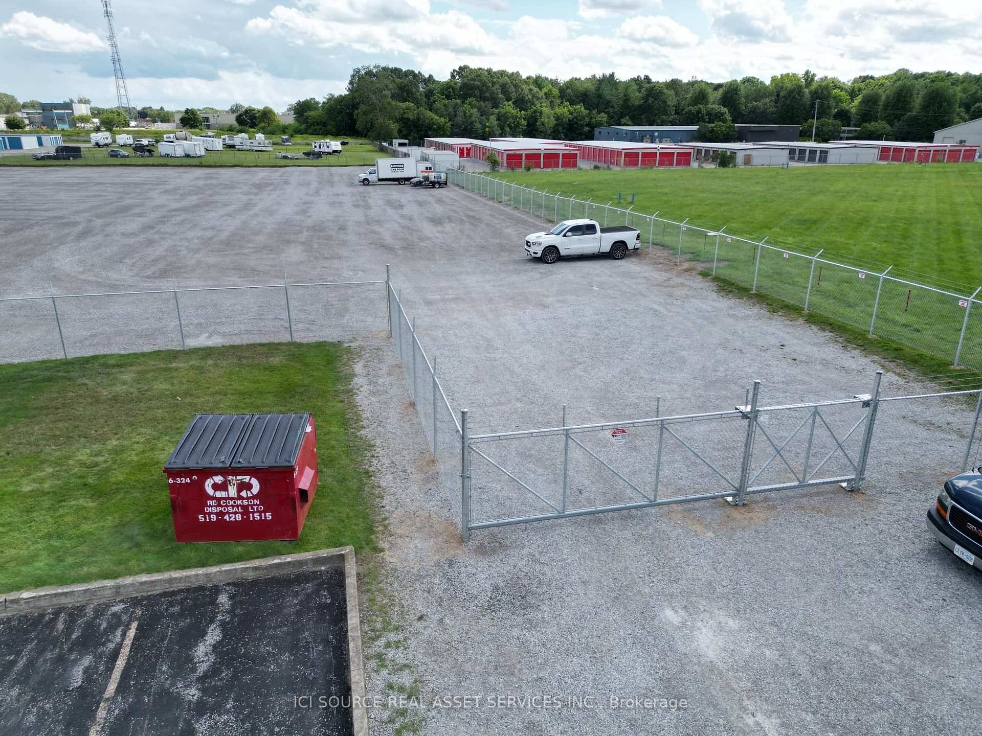 Vacant graded yard for rent, up to 1 acre.
