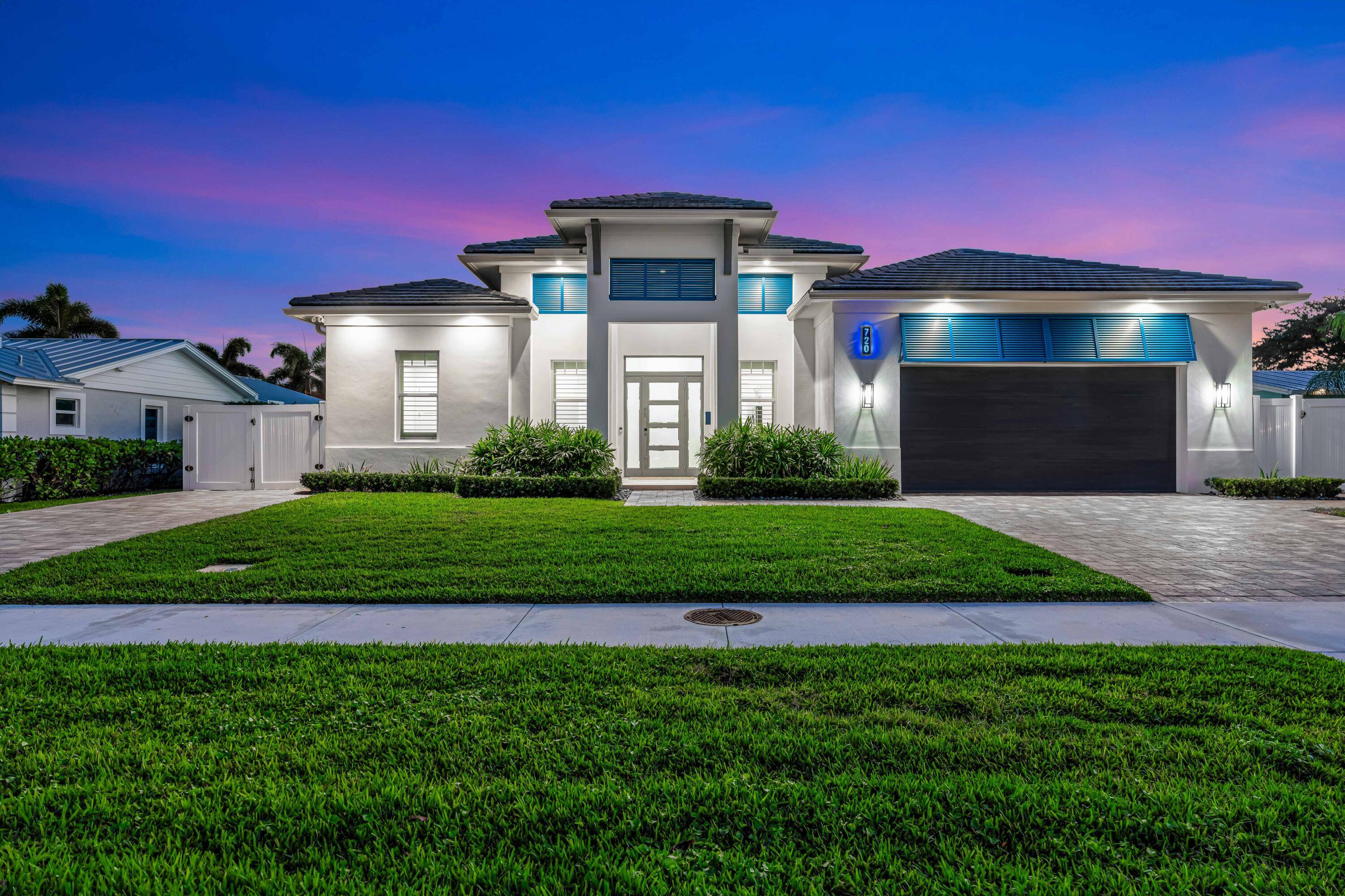 Experience coastal living in this 2022 custom built waterfront estate in prestigious North Palm Beach.