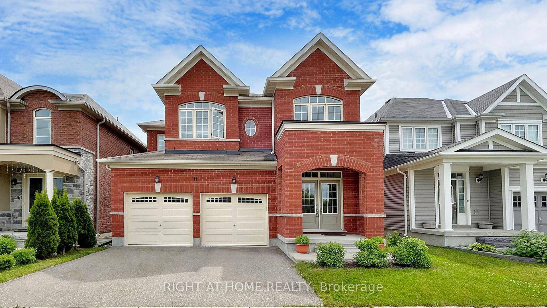 Welcome to this stunning 4 bedroom, 3 bathroom detached all brick home in the heart of Georgina.