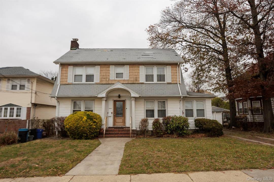 Welcome to this classic Single Family Colonial situated on an oversized 9, 000 sq ft lot in Springfield Gardens.