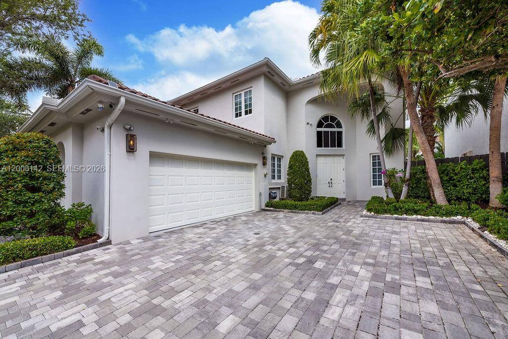 Live just steps from the beach in the private gated community of Golden Gate Estates, perfectly located between Golden Beach and Sunny Isles.