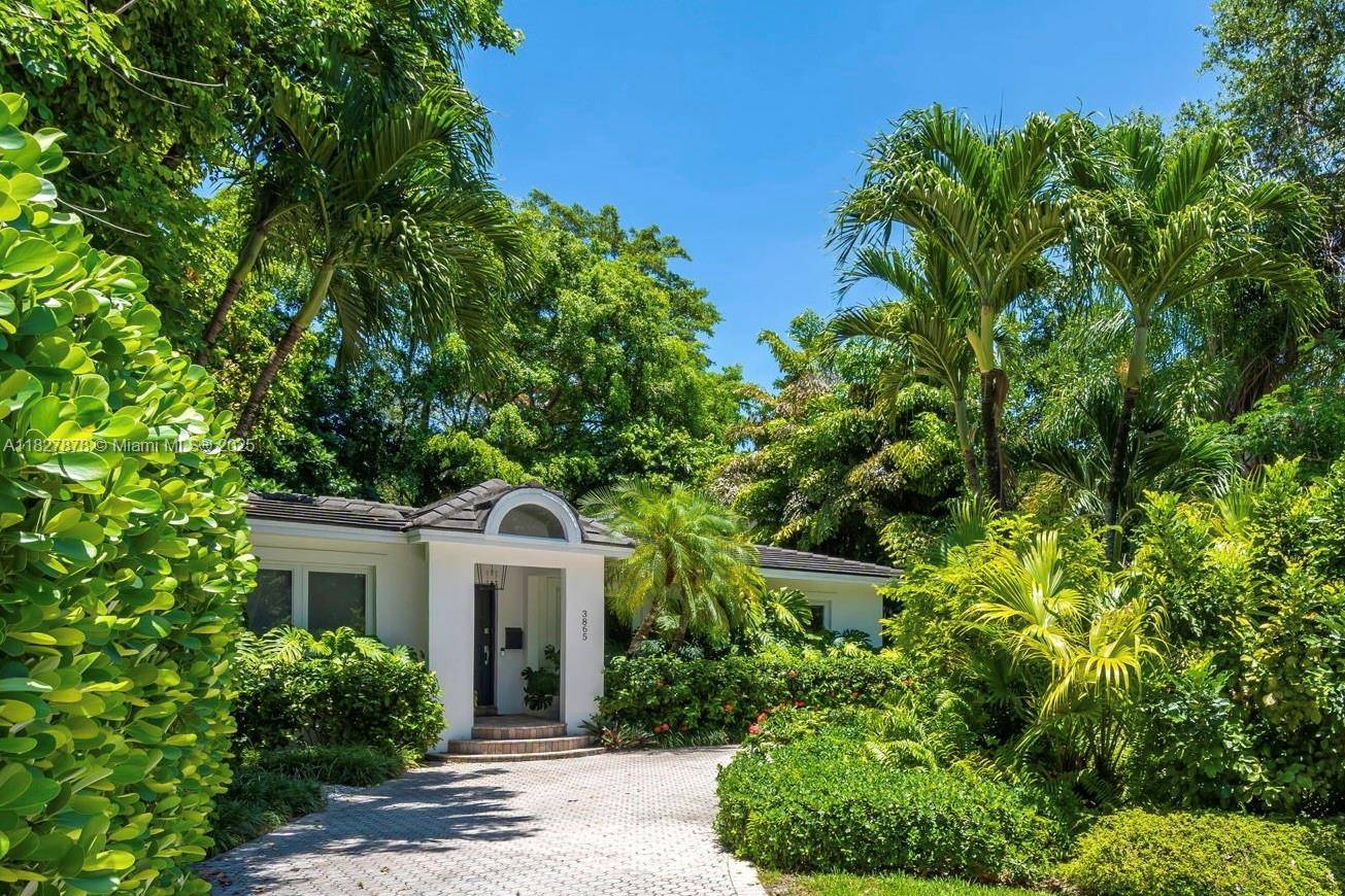 Lovingly maintained and tastefully updated, 3 beds, 2 baths home is nestled in one of South Grove's most lush and peaceful pockets.