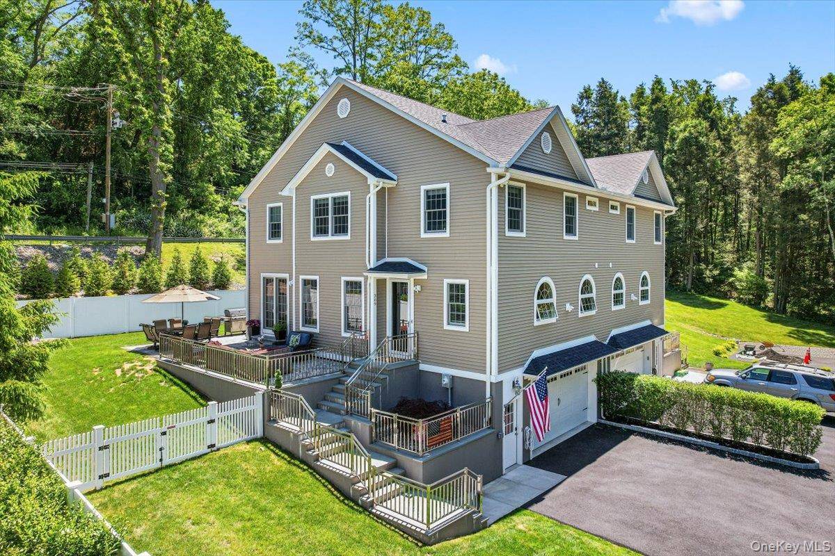Step into refined elegance with this 2022 open concept residence, where architectural sophistication and comfort converge.