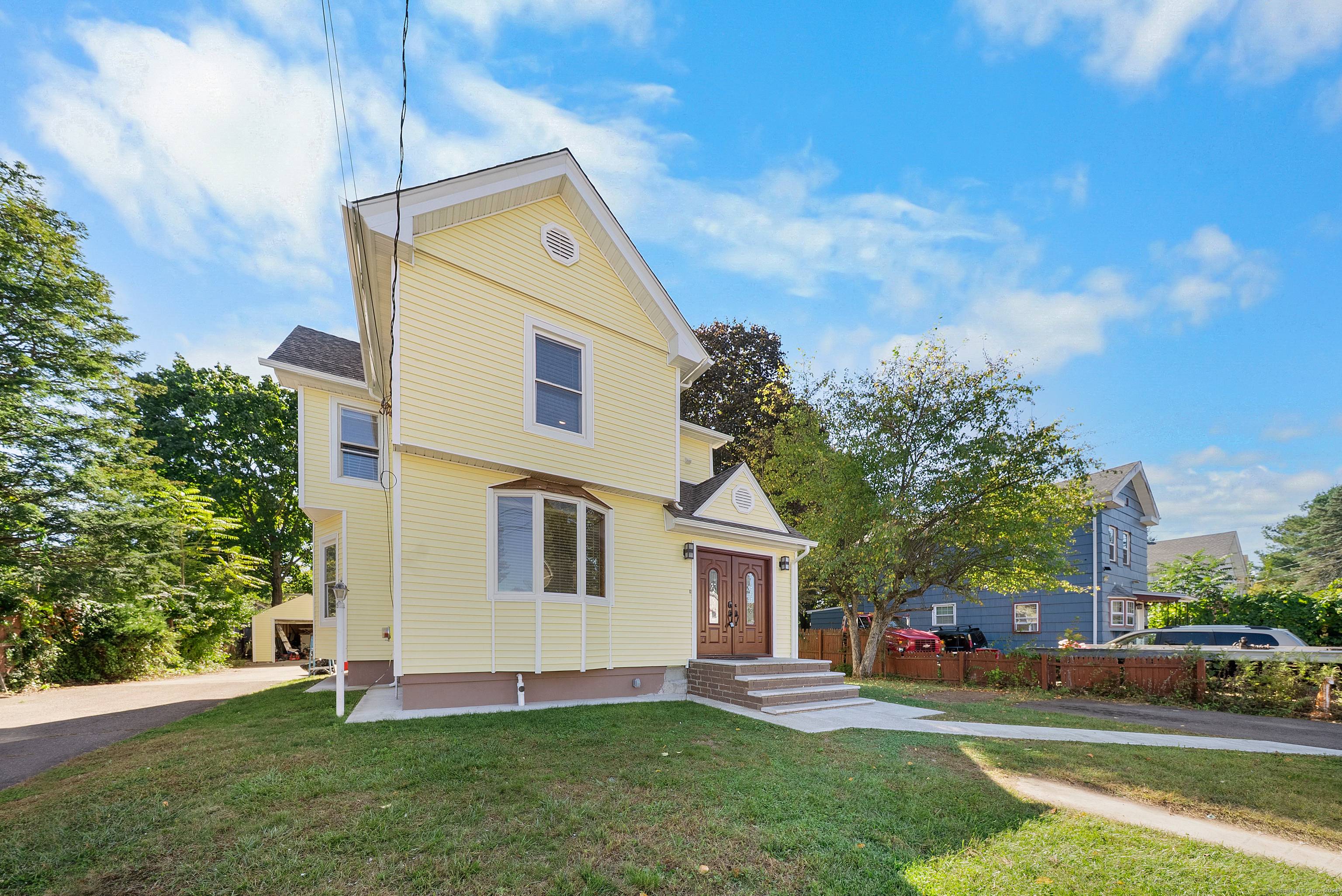Beautifully updated colonial featuring 4 bedrooms, 2 full baths, and an extra room perfect for a home office or TV room.