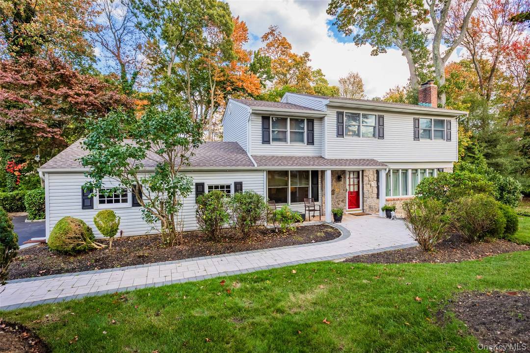 Quintessential Colonial on a private Cul De Sac Location North of 25A.