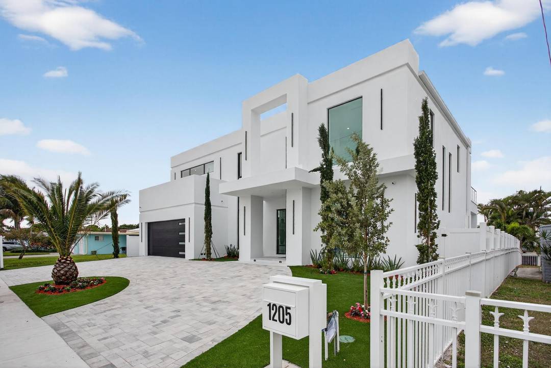 This spectacular brand new completed construction 75 ft water frontage home is designed for elegant coastal living.