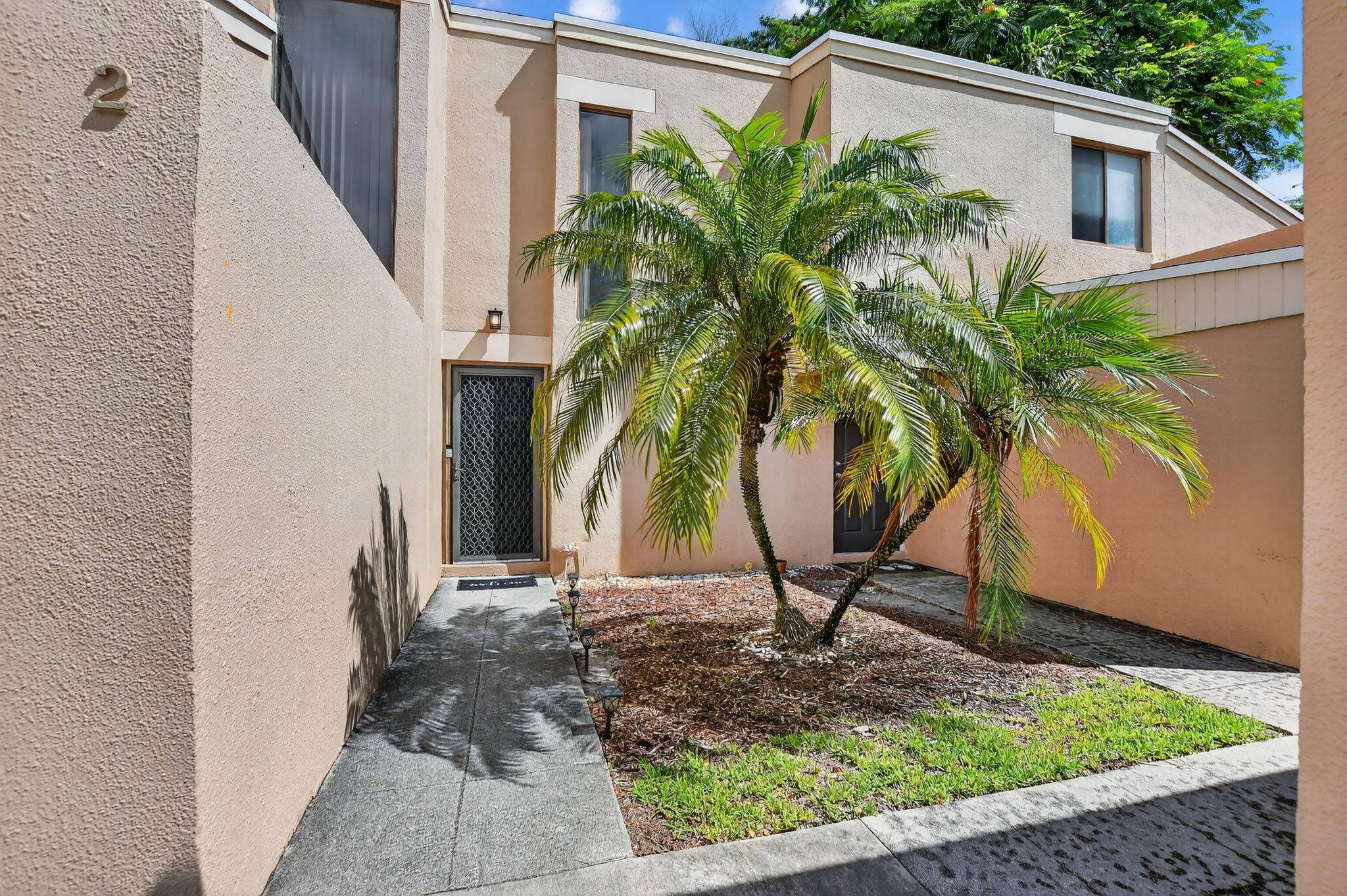 Welcome to this beautifully maintained 3BR 2BA townhouse in the heart of Boca Raton !