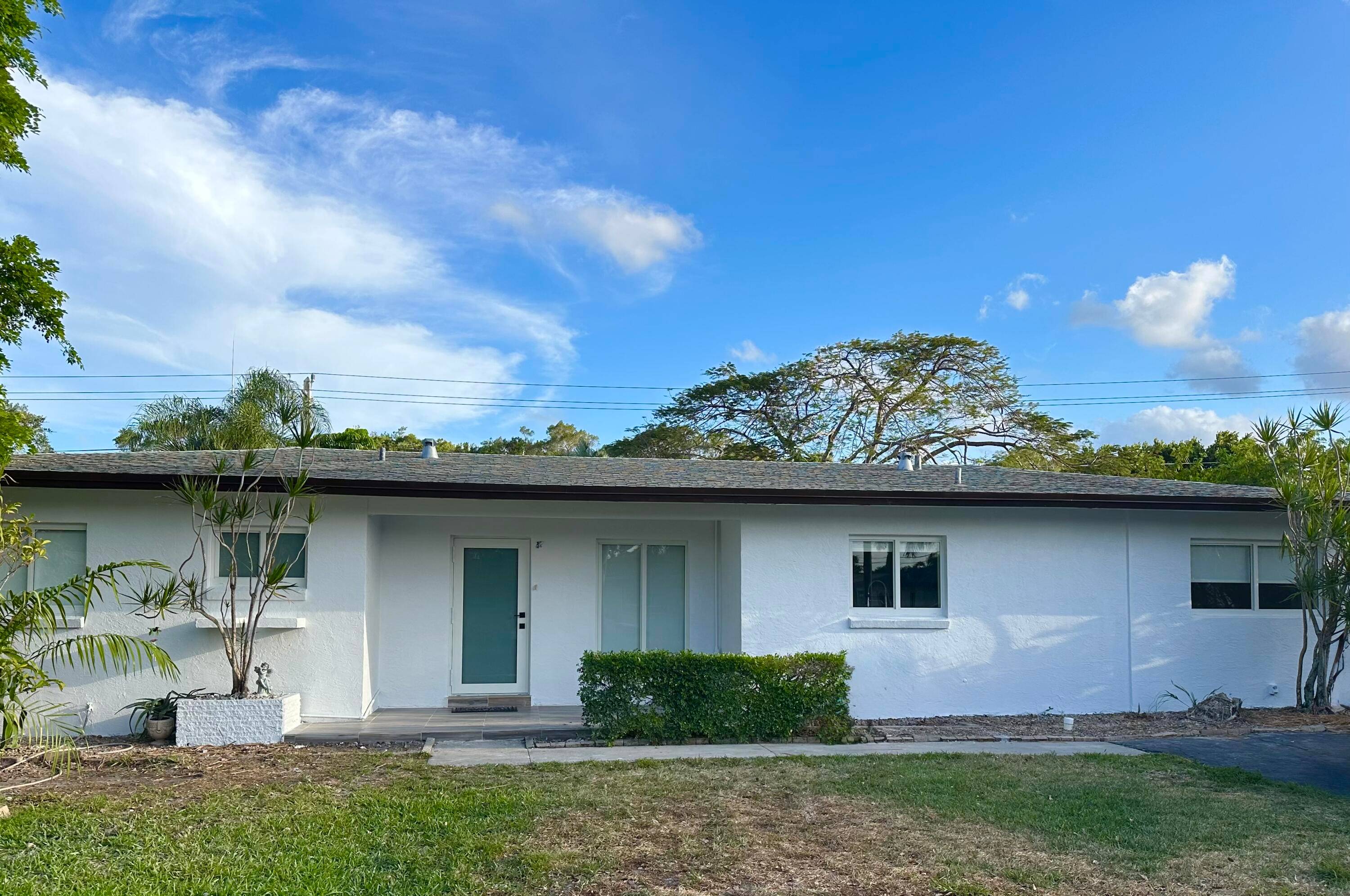 Welcome to this beautifully refreshed residence, with new hurricane proof windows custom made blinds, updated appliances, and so much more, situated in one of Boca Raton's most desirable central neighborhoods.