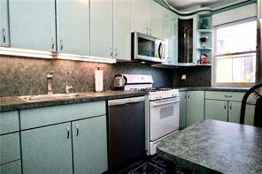 This exceptional two level condo in the highly sought after Bay Ridge neighborhood is a true masterpiece.