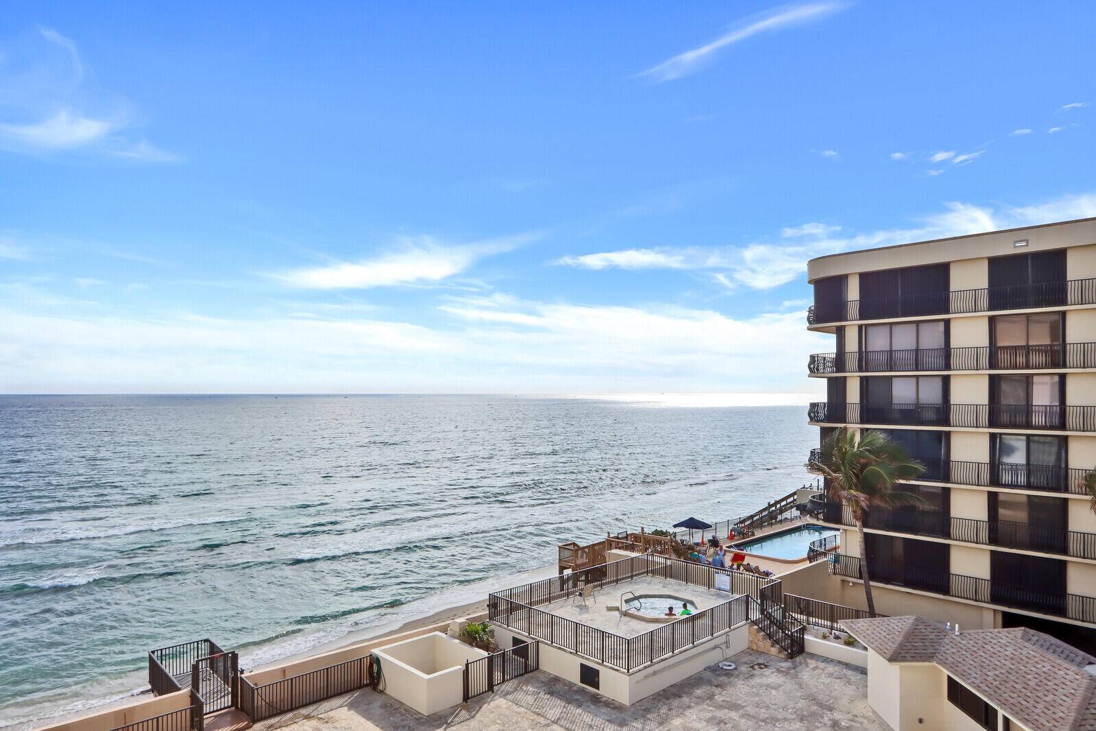 Live in paradise with stunning ocean and pool views in this exquisitely updated unit with porcelain tile floors, coffered ceilings, a chef inspired kitchen with stainless steel appliances plus of ...