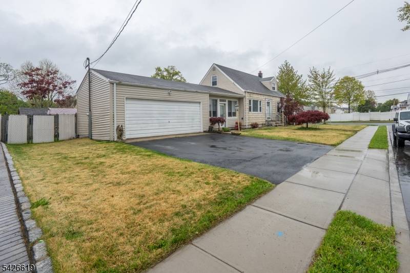 Situated on a well maintained corner lot, this move in ready Cape Cod offers a functional and straightforward layout that is ready for its next owners.