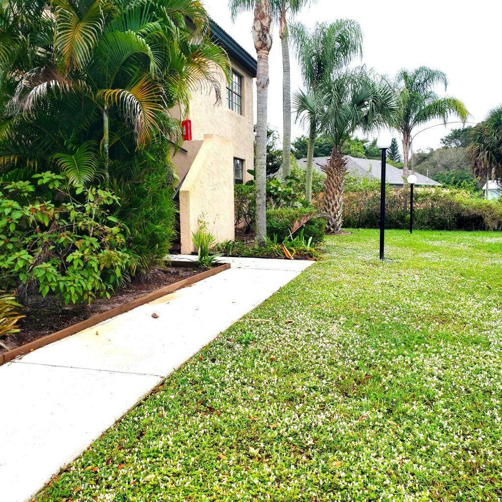 This cozy 2BR 2BA first floor condo is perfectly situated in peaceful Seagrass Condominiums in the back of the community with the view from screened patio.
