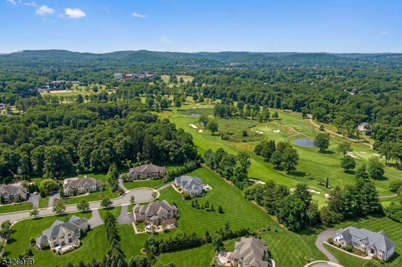 Nestled in Denville's most exclusive enclave, this exceptional home of distinction sits on the flagship lot in a private community of just 26 premier residences.