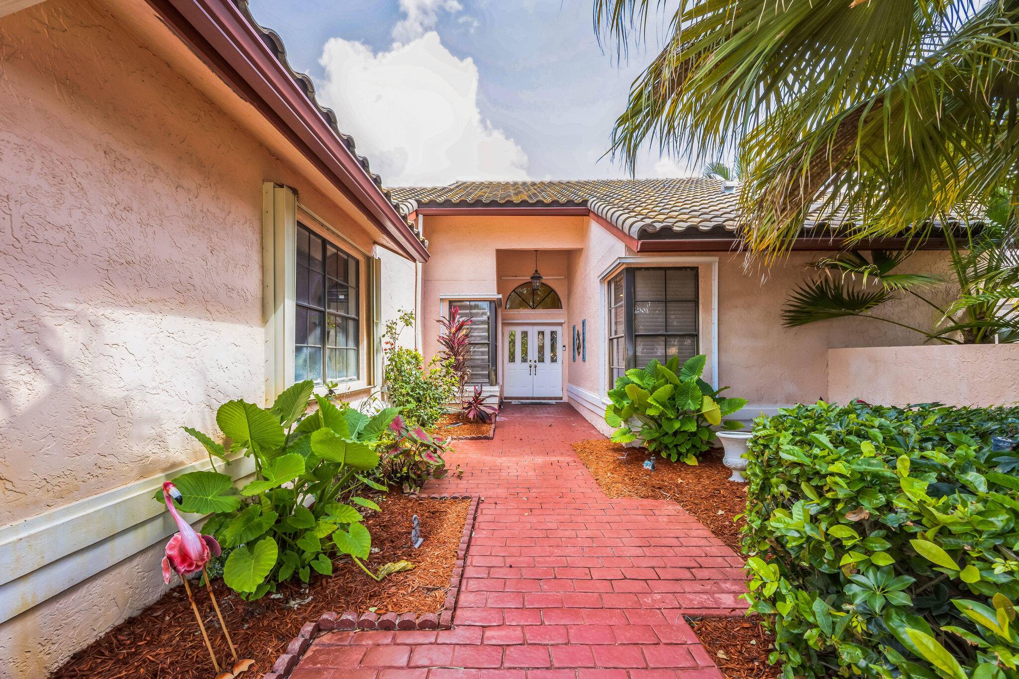 Gorgeous Updated 2 bedroom home in desired BOCA GREENS.